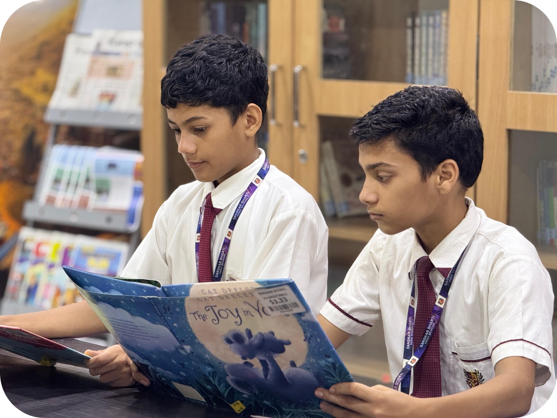 Students reading together in the library